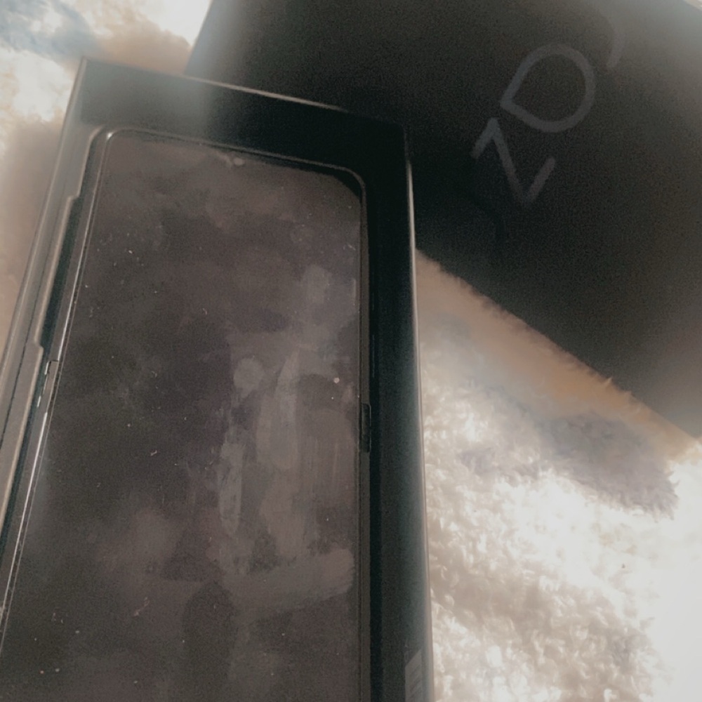 Motorola Black Smartphone with Black Box